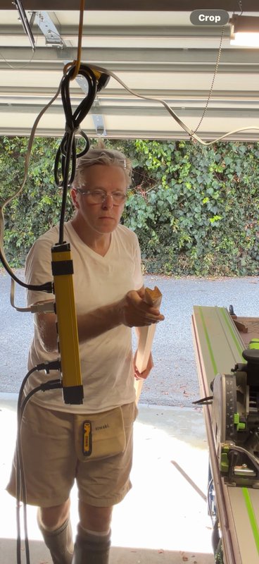 Cutting new stucco moulding.