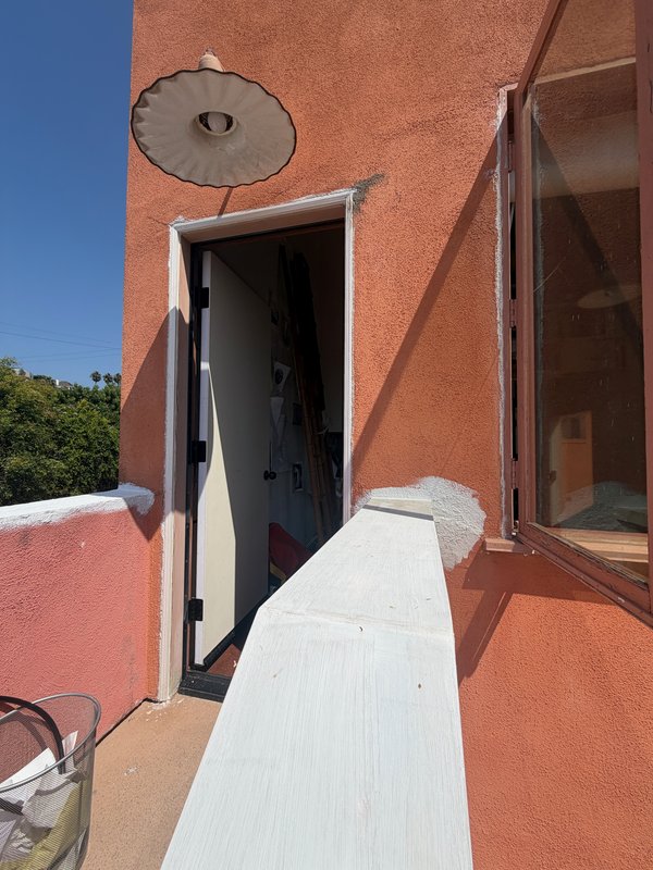 Installing new door moulding.